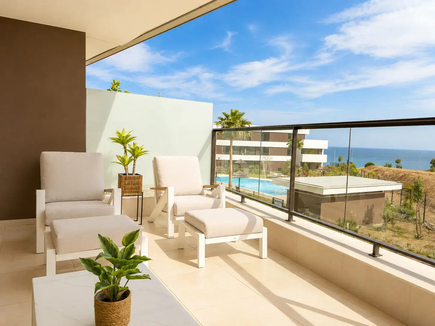 Private terrace with sea views over the community pool — Estepona Golf Retreat, Casares Costa